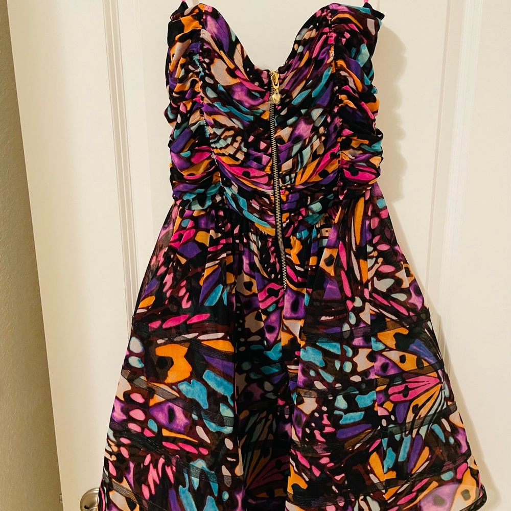 NWT strapless, butterfly like print Betsey Johnson dress. Zip front closure.